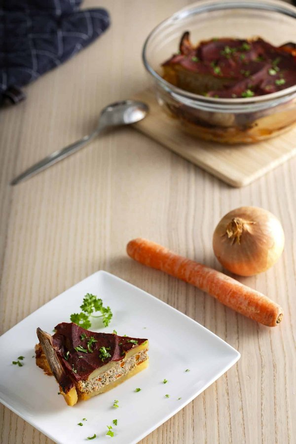 Wie bereitet man eine authentische griechische Moussaka mit Auberginen zu?